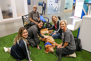 Enterprise Connect Attendees in Pet Therapy Station